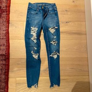 AE next level stretch ripped blue jeans